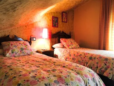 Cama o camas de una habitación en Casa Rural Cuevas del Sol