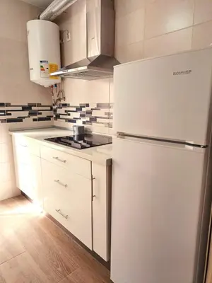 Una cocina o zona de cocina en Apartamento Plaza Santa Lucia RENOVADO FEBRERO 2025