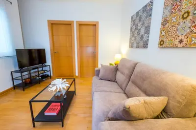 Una televisión o centro de entretenimiento en Castellar Centro Apartment