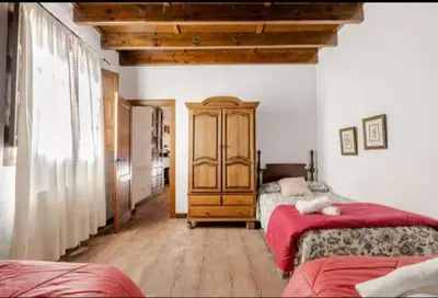 Cama o camas de una habitación en Alojamiento El Cortijuelo