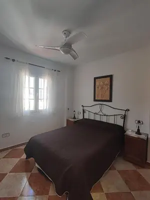 Cama o camas de una habitación en CASA RURAL FERRETE