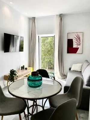 Una televisión o centro de entretenimiento en Apartamento Isasa
