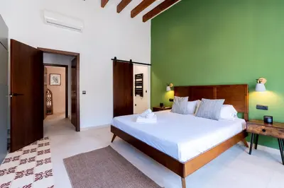 Cama o camas de una habitación en Lope de Vega by TheGoodTourist