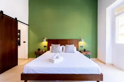 Cama o camas de una habitación en Lope de Vega by TheGoodTourist