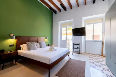 Cama o camas de una habitación en Lope de Vega by TheGoodTourist