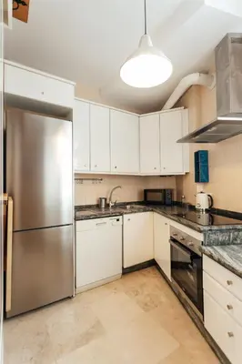 Una cocina o zona de cocina en Alohamundi Dúplex Alameda