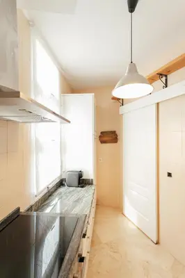 Una cocina o zona de cocina en Alohamundi Dúplex Alameda