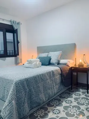 Cama o camas de una habitación en Bodegas de Felicidad