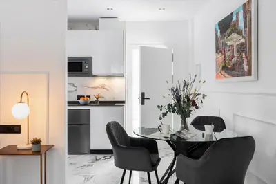 Una cocina o zona de cocina en Apartamentos Casa del Arco de 2 a 6 personas