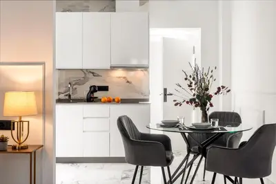 Una cocina o zona de cocina en Apartamentos Casa del Arco de 2 a 6 personas