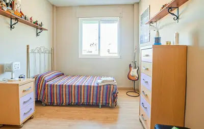 Cama o camas de una habitación en La Aracelitana