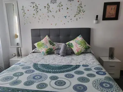 Cama o camas de una habitación en Casa Oasis Puertollano, una casa en un entorno rural en Puertollano, agradable, con Piscina en zona tranquila