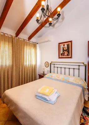 Cama o camas de una habitación en Casa de Ana Rosa