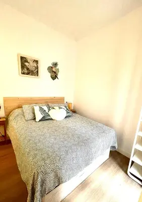 Cama o camas de una habitación en Apartamento en casco histórico de Córdoba/piscina