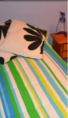 Cama o camas de una habitación en PISO CON BUENA RED WIFFI FIBRA ÓPTICA Alquiler de habitaciones