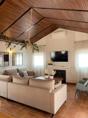 Una televisión o centro de entretenimiento en Casa rural La Alcaparra