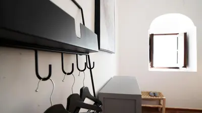 Una televisión o centro de entretenimiento en Palacete S-XVIII La Mezquit-a