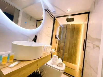 Un baño de Apartamentos Turísticos Córdoba Boutique Con jacuzzi
