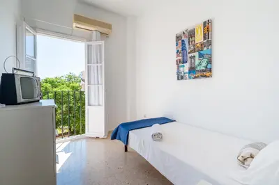 Cama o camas de una habitación en Sevillano apto en Centro cerca de Santa Justa