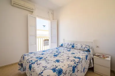 Cama o camas de una habitación en Sevillano apto en Centro cerca de Santa Justa