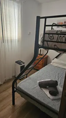 Cama o camas de una habitación en CASA RURAL SANTA ELENA