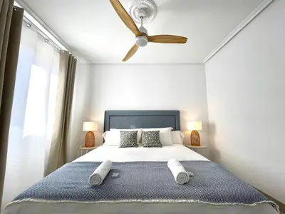 Cama o camas de una habitación en Apartamento el Arcángel de Córdoba