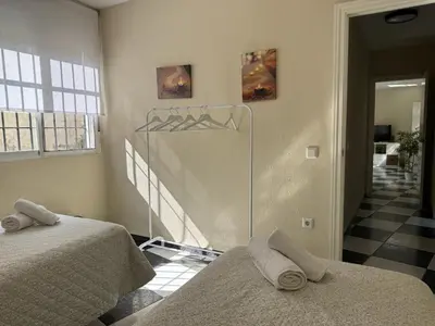 Cama o camas de una habitación en El rincón de Jesús y Loli