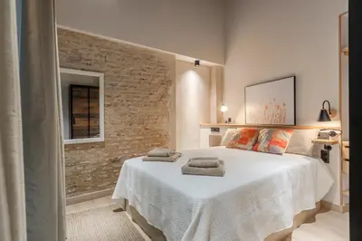 Cama o camas de una habitación en Berenguela Setas Lofts