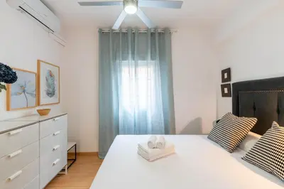 Cama o camas de una habitación en Bonito Callejón en la Judería by TheGoodTourist