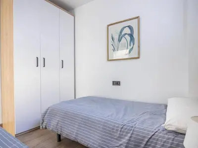 Cama o camas de una habitación en Nervión Suites 2 - Vacacional Sevilla