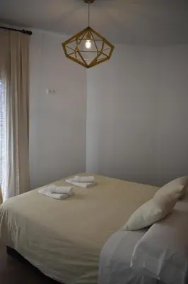 Cama o camas de una habitación en Apartamentos Molinos