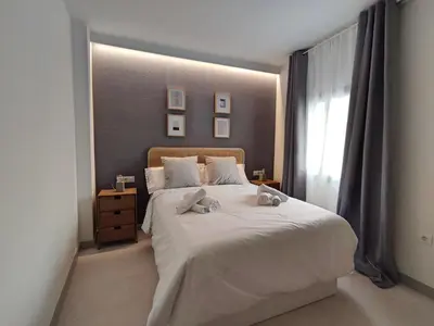 Cama o camas de una habitación en Alojamiento San Basilio Suite