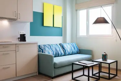 Zona de estar de Sercotel Sevilla Guadalquivir Suites
