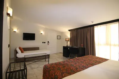 Cama o camas de una habitación en Hotel San Gil