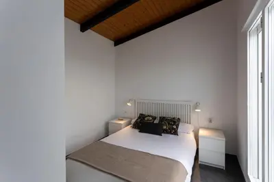 Cama o camas de una habitación en Terrace & chill Urban Penthouse
