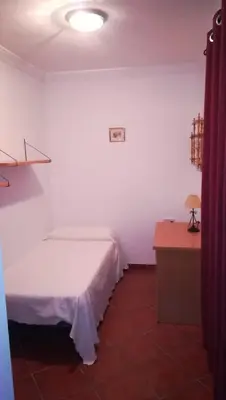 Cama o camas de una habitación en Hostal Colon Antequera