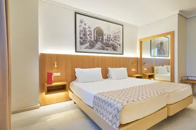 Cama o camas de una habitación en Exe Ciudad de Córdoba