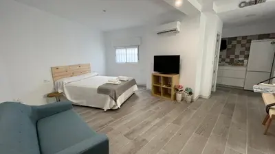 Una televisión o centro de entretenimiento en Apartamento Piedra Escrita