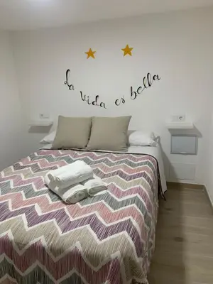 Cama o camas de una habitación en La Vida es Bella