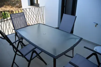 Un balcón o terraza de APTOS MILLÁN