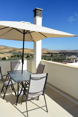 Un balcón o terraza de APTOS MILLÁN