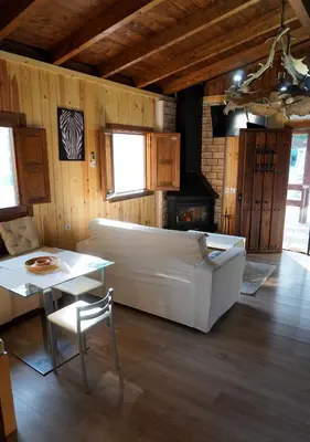Zona de estar de La Casa de Madera
