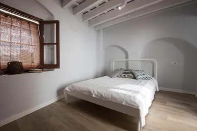 Cama o camas de una habitación en Apartamento La Casa del Santo