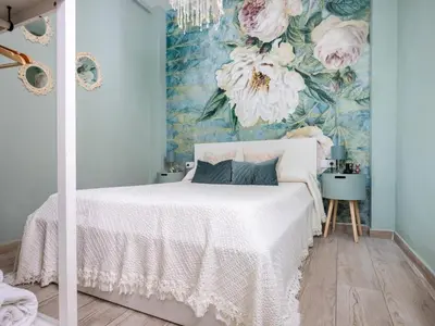 Cama o camas de una habitación en Nuevo Recaredo - Vacacional Sevilla