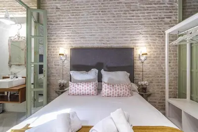Cama o camas de una habitación en Judería de Sevilla IV – Luxury Apartments.