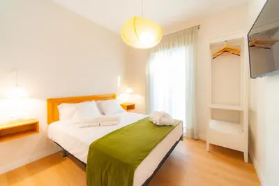Cama o camas de una habitación en Suites Casa San Mateo