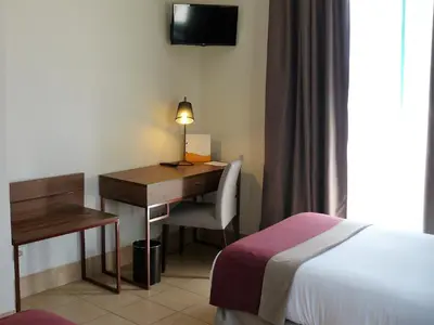 Cama o camas de una habitación en Hotel Oromana