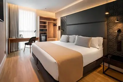 Cama o camas de una habitación en Catalonia Giralda