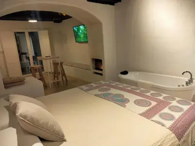 Cama o camas de una habitación en Casa Cueva El Naranjo Rocabella