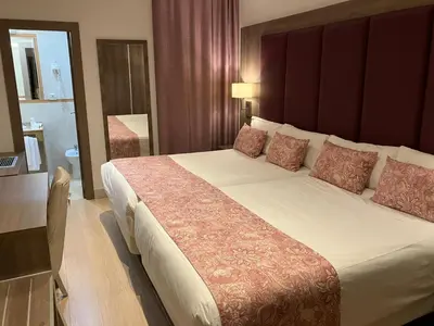 Cama o camas de una habitación en Hotel Selu